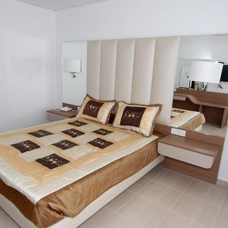 Royal Bay Suites Kéfalos Pokoj fotografie