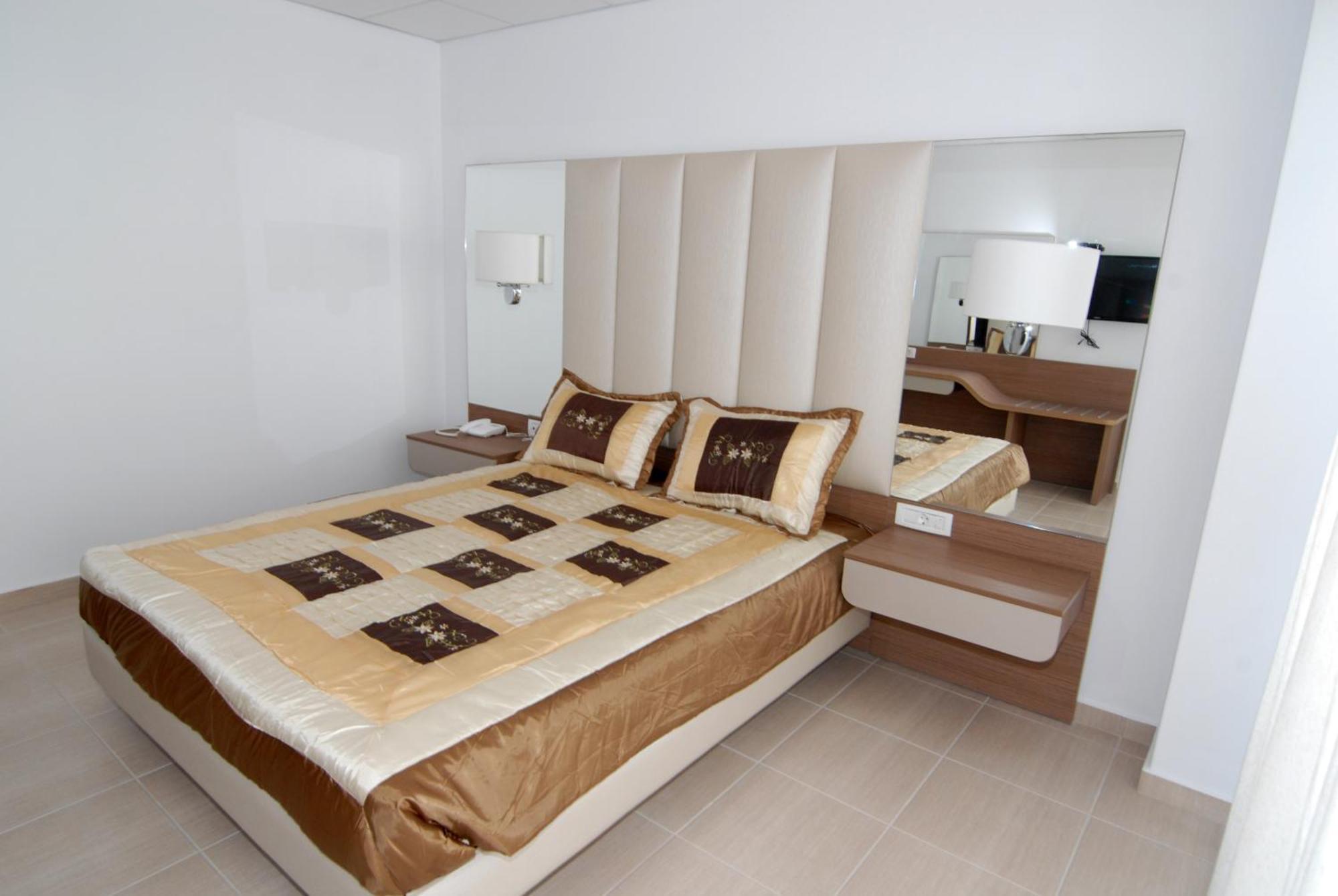 Royal Bay Suites Kéfalos Pokoj fotografie
